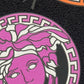 Medusa Head Textured Wallpaper in Black/Multi from the Versace V Collection