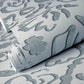 Fiore Operatic Flowers Wallpaper in Poppy Seed