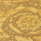 Floral Swirl Textured Wallpaper in Gold from the Versace IV Collection