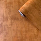Tonal Plain Industrial Wallpaper in Orange