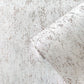 Speck Industrial Mottled Wallpaper in Rose Gold